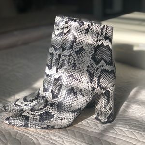 Beautiful Marc Fisher bone and black snake ankle boots